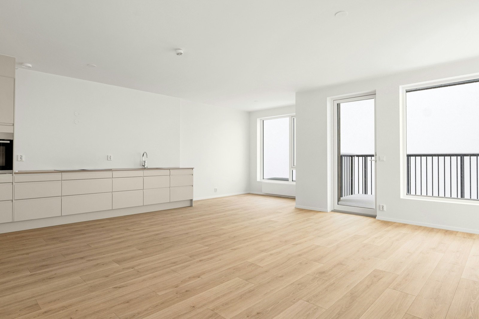 Séjour lumineux repeint dans une maison
